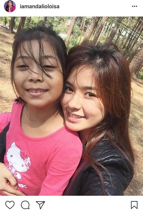 Loisa with her one big happy family .